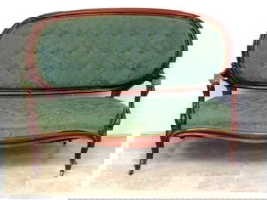 A Victorian Era Mahogany Loveseat