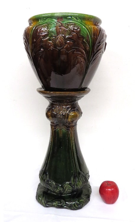 Majolica Glazed American Art Pottery Jardinière On Stand: A marriage, but color wise they so blend well together one does not notice it. The jardinière is 10" height and 10.5" rim diameter (outside edge). Stand is 18.5" in height, so 28.5" overall.