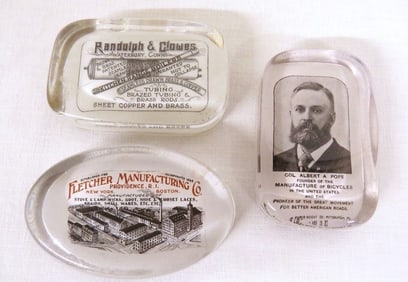 Trio of late 19th C. Advertising Paperweights