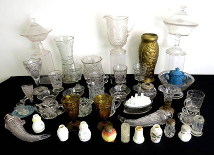 EAPG Incl. Gridley Pitcher, 1876 Centennial, etc.: A mixed group of mostly EAPG includes a Gridley water pitcher, a group of 1876 centennial goblets & footed bowls, hair receiver, Cupid & Venus goblet, covered bowls etc. in many different patterns. Ge