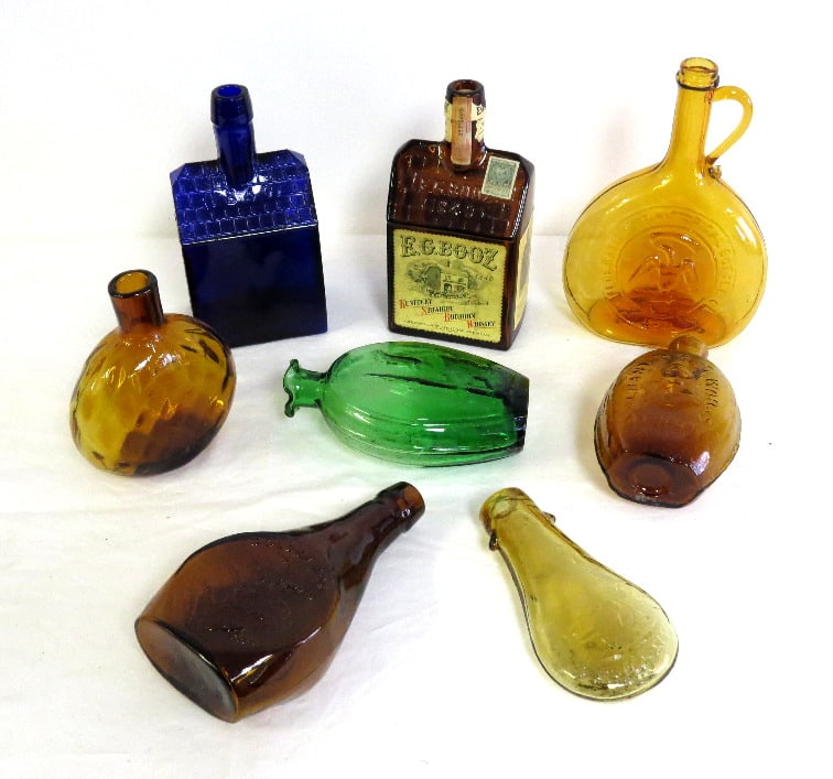 Lot of MCM era Clevenger Bottles Incl. Cobalt E.G. Booz Cabin: The E.G. Booz cabin whiskey is an icon in the bottle collecting world. Original's are highly sought after and very expensive but their popularity spurred a resurgence of interest in them starting in t
