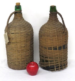 Matching Pair of Blown Glass Demijohn's - Still in Wicker, One w/Tag, Other w/Contents