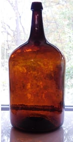 A Pontiled "Old Amber" 19th C. Straight Side Demijohn Possibly Stoddard