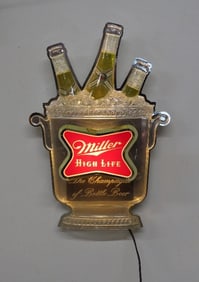 A 1960's Miller Highlife Champagne Bucket Light Up Sign