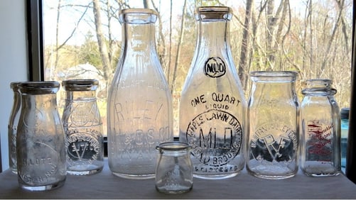 A Grouping of 8 New Jersey Milk Bottles