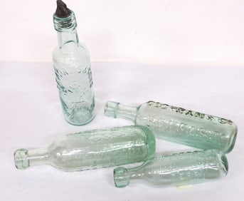 A Grouping of 4 English/Irish Soda Water Bottles