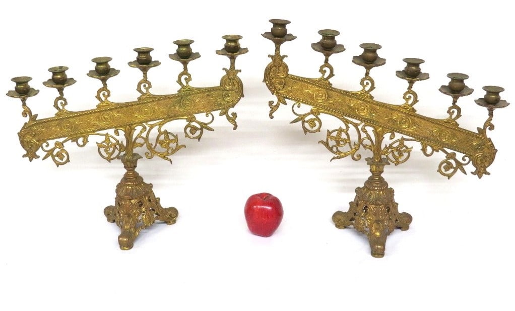Two Fancy Gilt Bronzed Aesthetic Period Candelabra's: Two mid-late 19th C. gilt bronzed Aesthetic period candelabra stands, possibly for church use, each holds 6 candles. Both are 19" wide, heights of 17.5" and 16.5" at higher ends. Unsigned but very ela