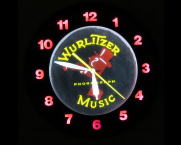 A Wurlitzer Phonograph Electric Light Up Clock