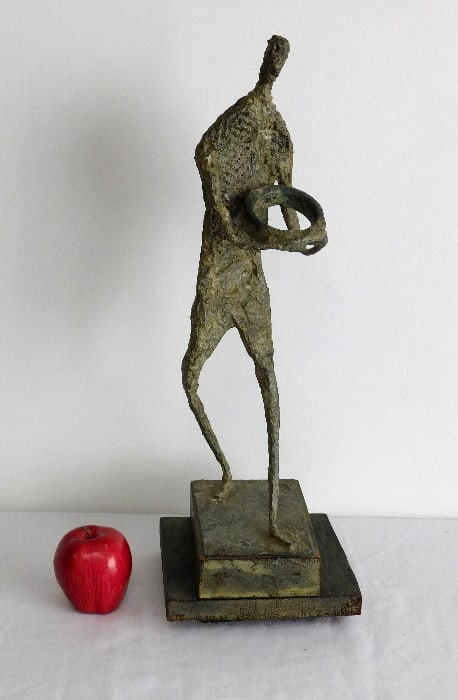 Herbert Kallem (American, 1909-1994) Sculpture: A Herbert Kallem (1909-1994) Mid-Century Sculpture signed on base with date of 64'. Figure stands 21" in height, set on a small wooden lazy susan base that rotates 360 degrees, adding another 2" to th