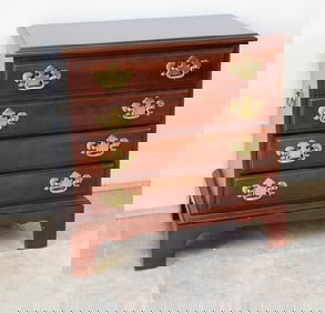 A Four Drawer Chippendale Style Cherry Chest by Hooker Furn.