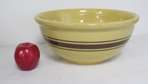 A Large Brown Banded Yelloware Bowl