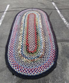 A Braided Country Oval Rag Rug 137" x 64"