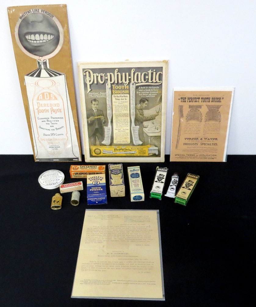 Antique Dental Advertising, Tins & Toothpaste Lot: Antique dental advertising/toothpaste, toothbrush advertising lot includes ADS Peroxide Toothpaste Paper sign (shrinkwrapped on cardboard), testimonial letter, product tins & tubes including black ame