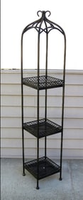A Wrought Iron & Black Granite Topiary Plant Stand