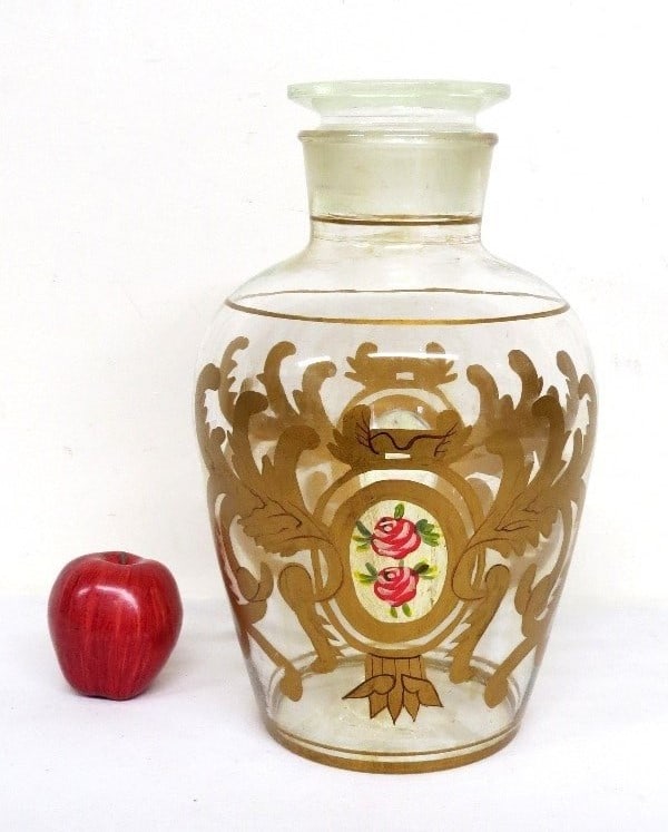 French Hand Painted Apothecary Jar w/Ground Stopper: c.1900's French apothecary jar w/hand painting including roses in center. Blown w/ground glass stopper, smooth based. Stands 16.5" in height, approx 10" diam. Note - This lot can be shipped in-house,