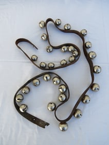 A 6 Foot String of Sleigh Bells on Leather