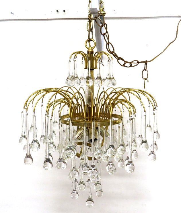 An Italian Venini Mid-Century Blown Glass Teardrop Chandelier: A mid-century Italian brass & glass teardrop chandelier with 2 tiers of drops, takes 6 candelabra base bulbs. About 22" long overall (not including chain) and 18" diameter