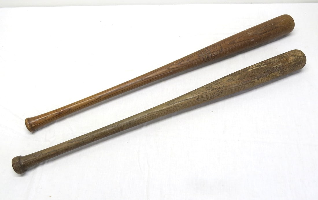 Two Early Wooden Baseball Bats, Joe DiMaggio and Babe Ruth: Two early wooden baseball bats, one a Louisville Slugger 40BR Babe Ruth model, the other a MacGregor Goldsmith No. 38 Joe DiMaggio example.