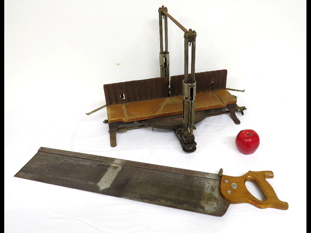 Stanley No. 358 Mitre Box Frame and Saw: A vintage Stanley No 358 Mitre Box Frame and accompanying saw, signed on the blade by Disston.