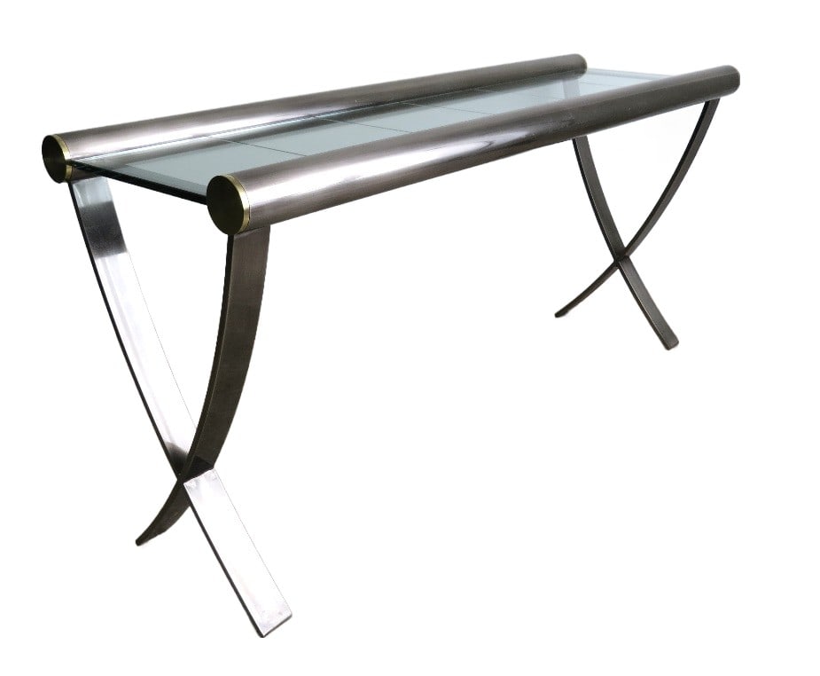 A Chrome, Brass & Glass Sculpted Console Table: A satin chromed finish with brass ends sculpted console table with glass insert top, measuring 61" in length, 28.5" height at glass top, 20" depth. Unsigned, vintage 1970's-80's look to it.
