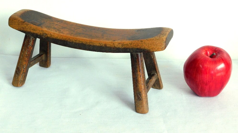 A 19th C. Wooden Headrest or Neck Pillow Bench: Looks uncomfortable doesn't it? But this was what was used in some parts of the world in that time. African, possibly Asian carved wooden neck rest or head pillow bench, measuring 11 1/8 wide, 4.75" h