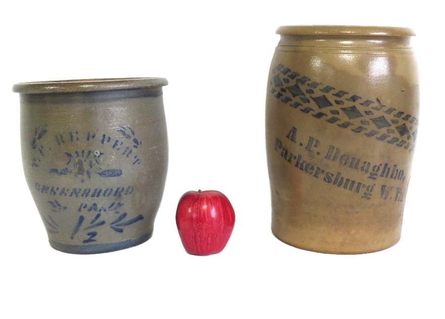 T.P. Reppert Greensboro, PA and A.P. Donaghho W.V. Stenciled Stoneware Jars: Two pcs, first a T.P. Reppert Greensboro, PA stenciled cream pot, the other being a A.P. Donaghho Parkersburg, W.V. Storage Jar. Heights of 9" and 11.75" respectively