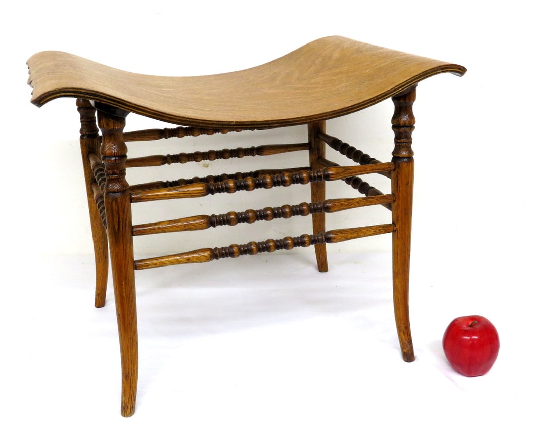 Egyptian Revival Crocker Chair Co. Oak Bentwood Stool: Early 20th C. Egyptian Revival laminated oak bentwood stool by Crocker Chair Co. Minor veneer loss at edge left side. Approx 22.5" wide, 17.5" height and 15.5" depth. Solid & sturdy