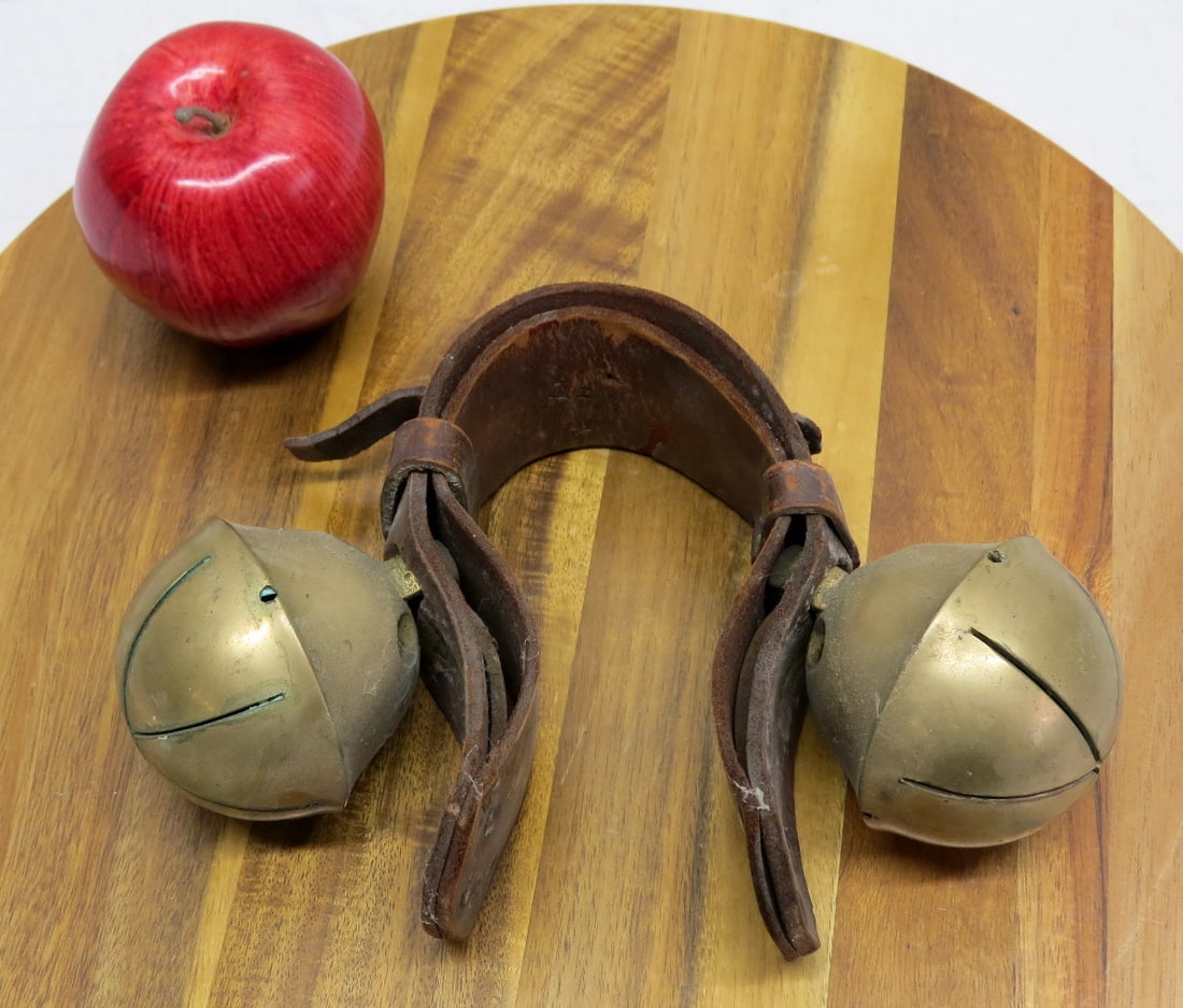 3" Diameter Brass Harness or Crotal Bells on Leather: A pair of leather mounted brass harness or crotal bells. Bells are 3" diameter on original leather.