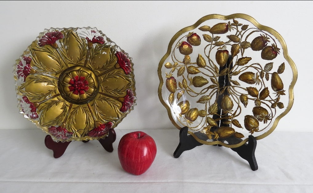 Two Goofus Glass Early 20th C. Painted Plates: Two lovely Goofus Glass plates, early 20th C. One in a fine strawberry & leaf pattern possibly Dugan or Northwood strawberry plate measuring 11.25" diam, the other 10.75" diam.