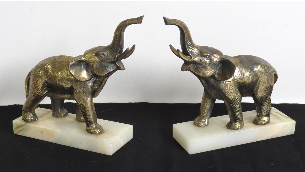 Mid-Century Elephant Bookends on Marble bases: Mid-Century Elephant Bookends on Marble bases, bases are 7" by 2.5" and height of 7.75"