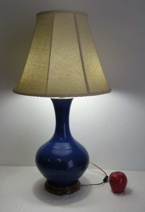 Chinese Qing Porcelain Blue Lamp w/Double Pull Chain Sockets: Chinese Qing porcelain monochrome blue lamp with double pull chain socket and shade height adjuster, set on turned wood base, fairly heavy. Believed to be a vase turned into a lamp but has not been di