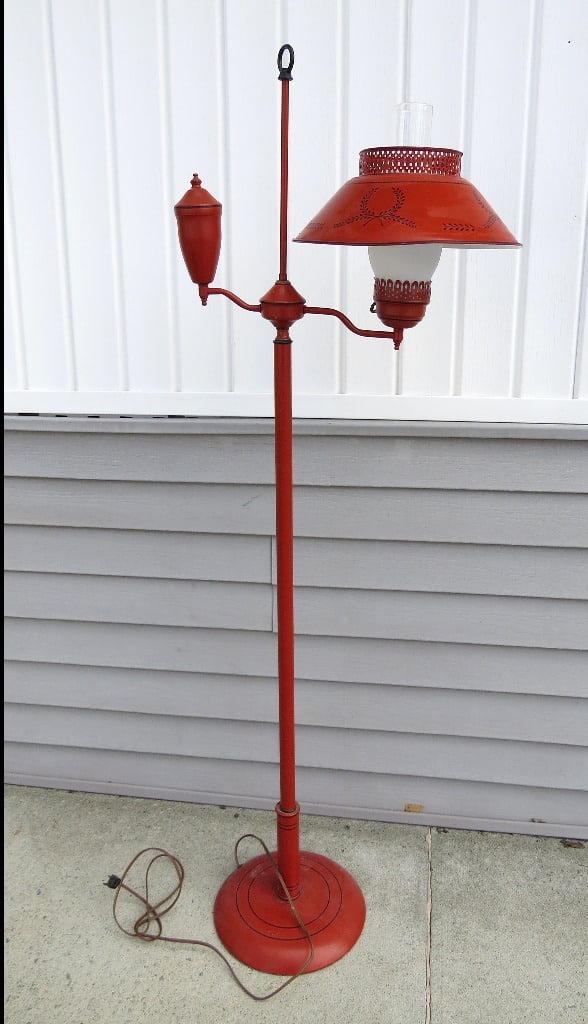 Mid-Century Burnt Sienna Red Tole Floor Lamp: A mid-century metal tole floor lamp in a burnt sienna red color with frosted shade, working, XX in height.