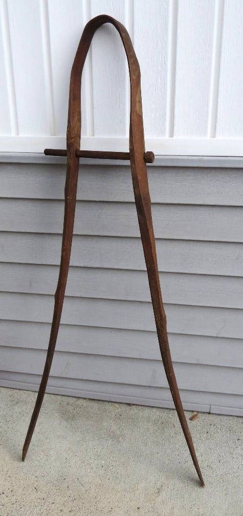 A 19th C. Bentwood Invalid's Crutch: The most unusual crutch we've ever encountered in this single piece bentwood example with mortised pin. Crutch is 45" in height, the pin about 33" height. If you like primitive, this is certainly it.