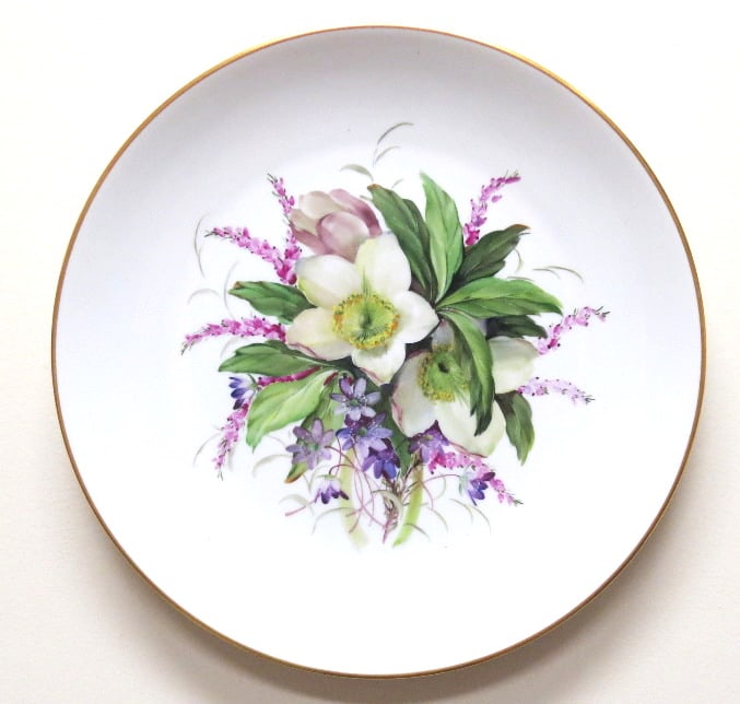 A Rosenthal Porcelain Charger - Germany: A lovely studio line Rosenthal Germany Porcelain Charger decorated with a floral variety, measuring 13" diameter, no damage.