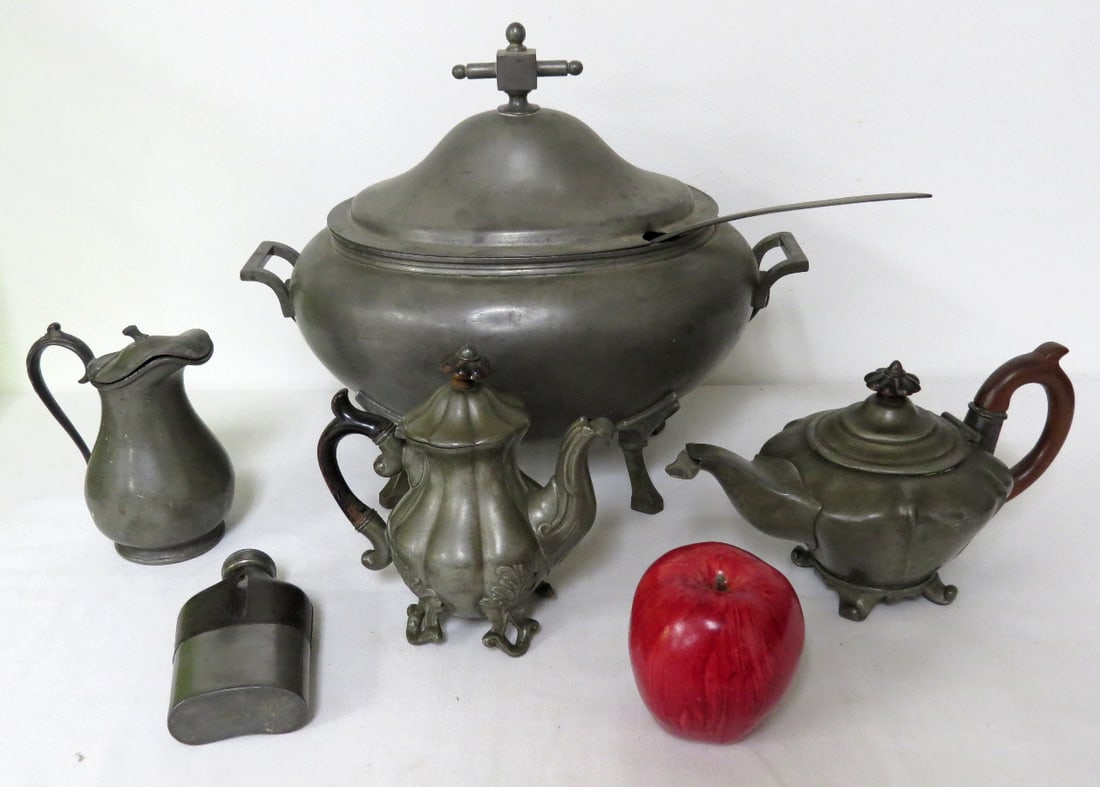 Lot of Early Pewter - 1867 Asberry Patent Tureen, James Dixon, Etc.: A mid 19th C. English Pewter tureen dated 1867 on base with ladle, marked Asberry Patent with English Crown Mark. Measures 14" long, 11" height and 10" diameter. Overall good condition for its age w/m