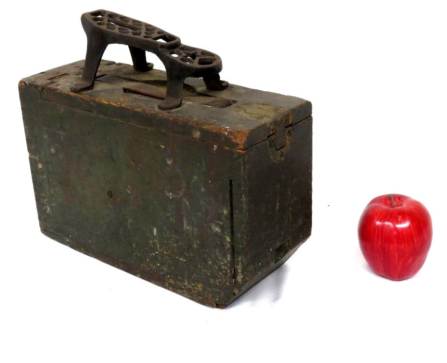 Antique Shoe Shine Box in Old Green Paint: An early shoe shine box in old green/gray paint with cast iron foot rest on top. Picture the young boys of the Depression era and earlier working the train stations, barber shops and other locations w