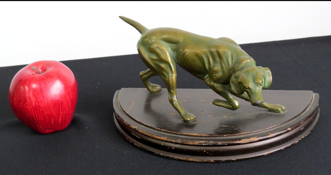A Period Hunting Dog Bronze on Demilune Base Late 19th/Early 20th C: Hunting dog bronze on Demilune base, unsigned. Head lowered on the scent about to give chase. Measures about 10" at base. Highly detailed bronze with great detail and a sense of the excitement of the