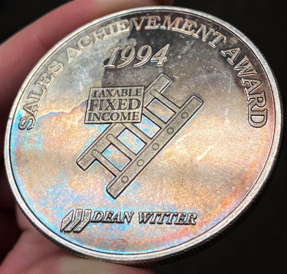 Toned Proof 1994 Sales Achievement Award Dean Witter 2 ozt .999 Silver: Winner shall receive the exact coin shown here. (RR)