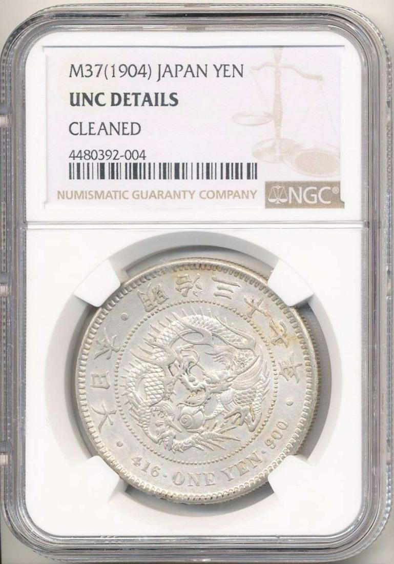 M37(1904) Japan Yen NGC Unc Details Cleaned: By U.S. coin grading standards, we would grade this coin MS64 Details.Winner shall receive the exact coin shown here. (RR)