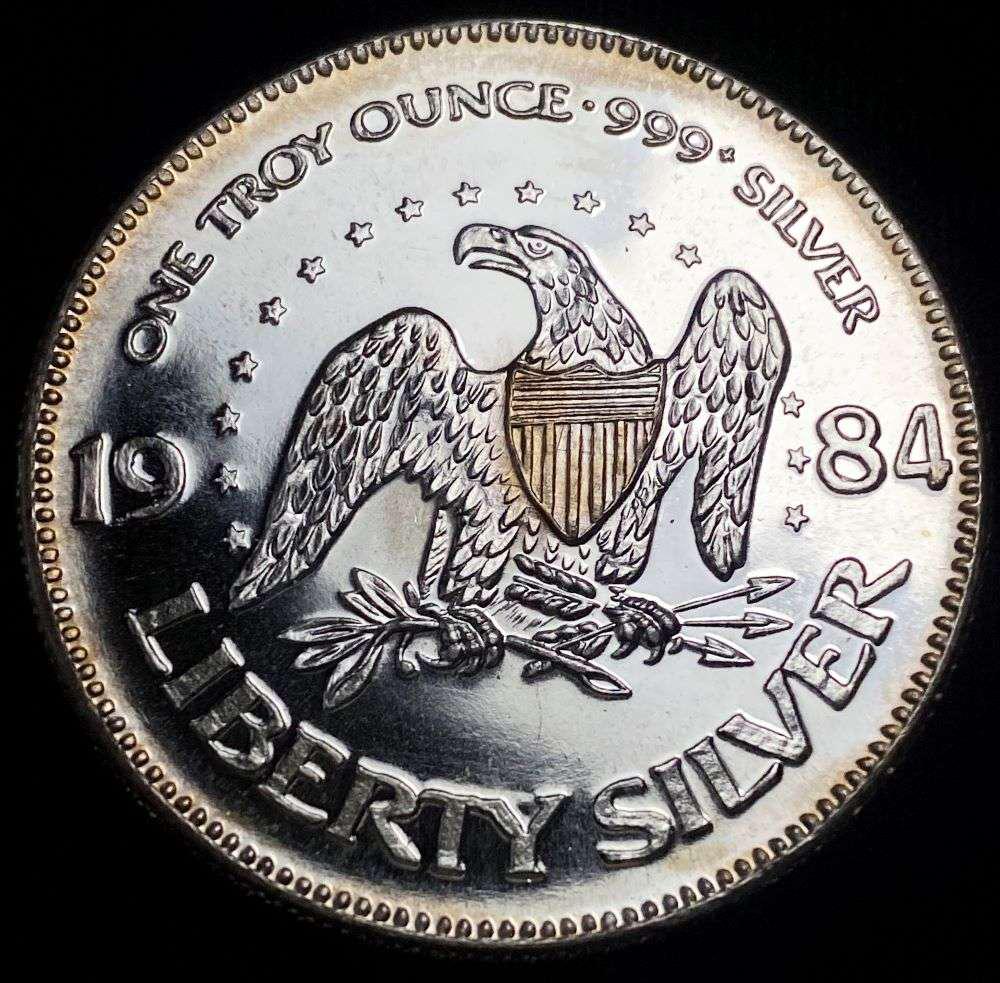 1984 A-Mark "Life Liberty Happiness" Proof 1 ozt .999 Silver: Winner shall receive the exact coin shown here. (RR/B)