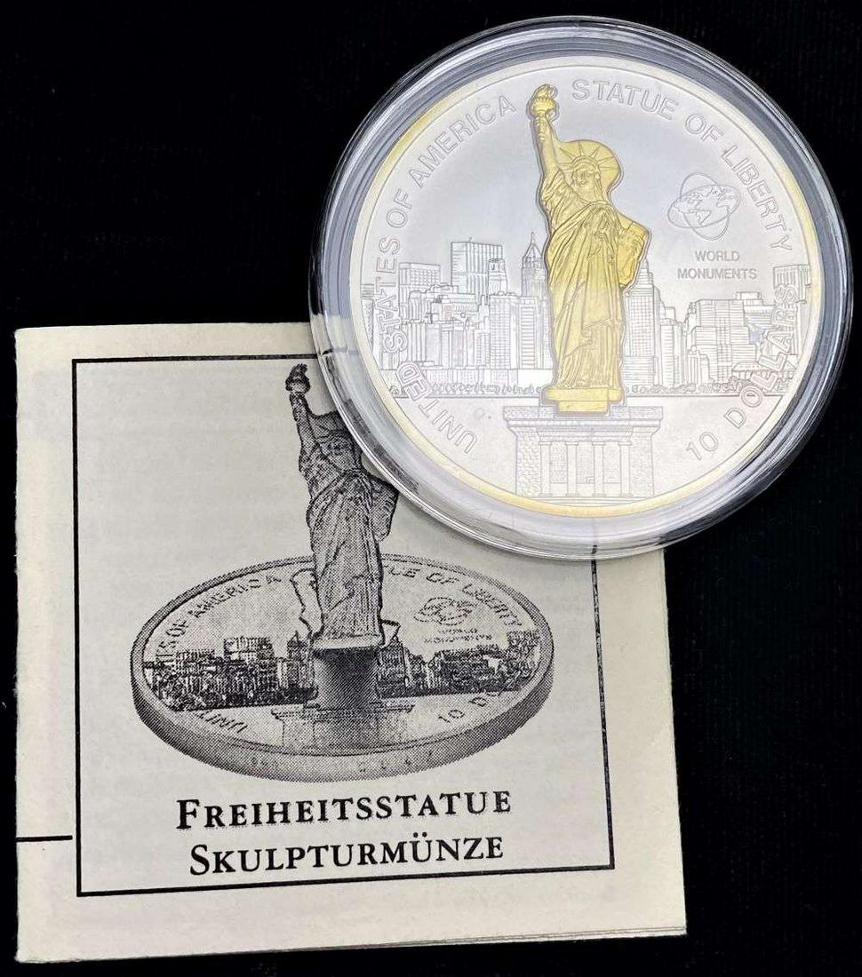 2006 Cook Island $10 Statue Of Liberty .999 Silver W/ 24k Gold Plated Statue: Winner shall receive the exact coin shown here. (RR)