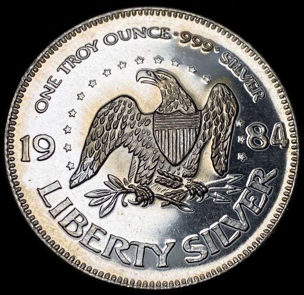 1984 A-Mark "Life Liberty Happiness" Proof 1 ozt .999 Silver: Winner shall receive the exact coin shown here. (RR/B)