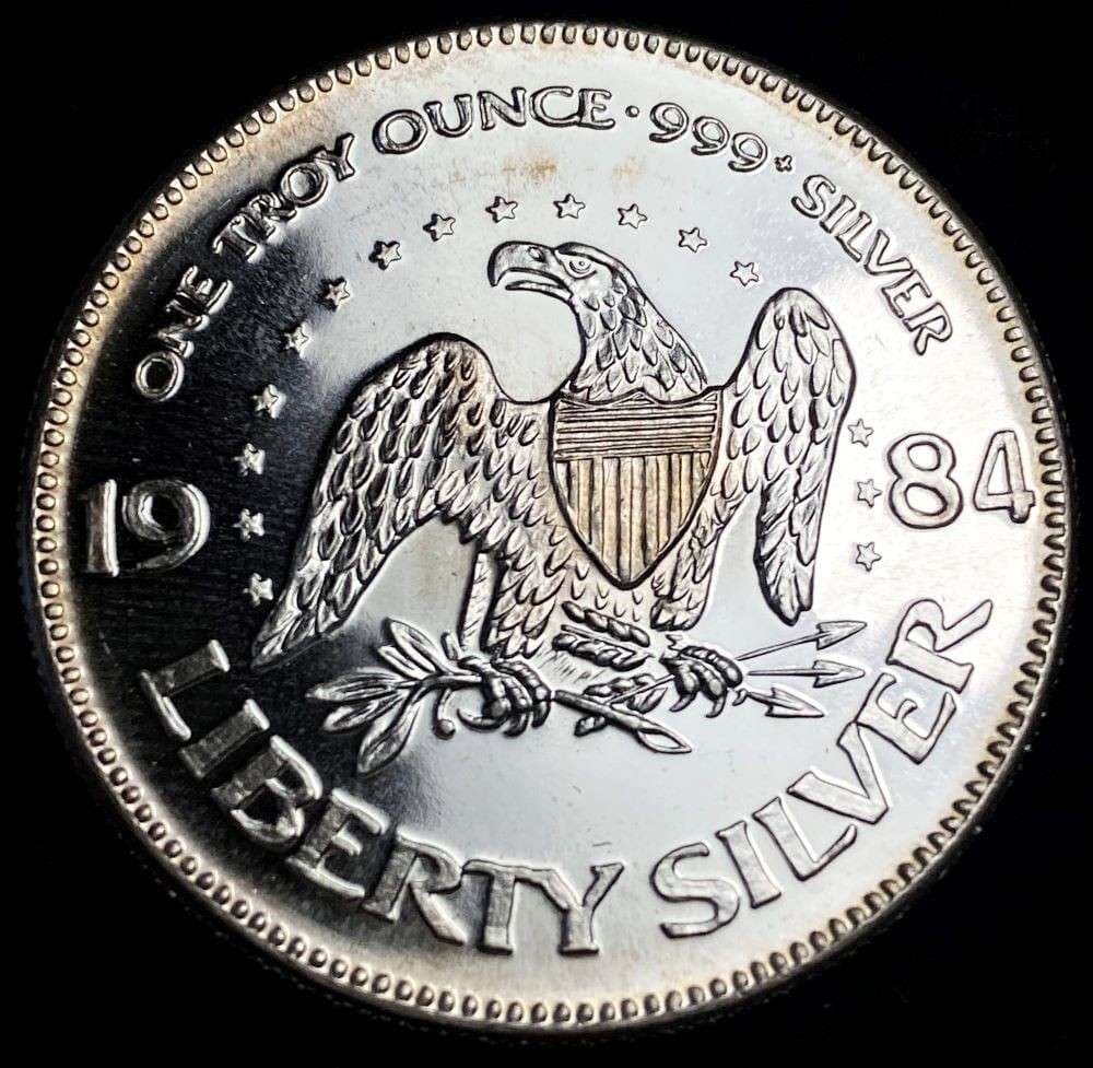 1984 A-Mark "Life Liberty Happiness" Proof 1 ozt .999 Silver: Winner shall receive the exact coin shown here. (RR/B)