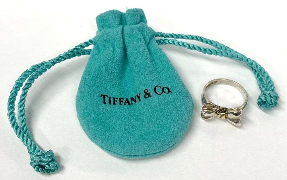 Tiffany & Co. Bow Ring .925 Sterling Silver W/ 18k Gold: This ring is a size 5.5. Winner shall receive the exact item shown here. (RR)