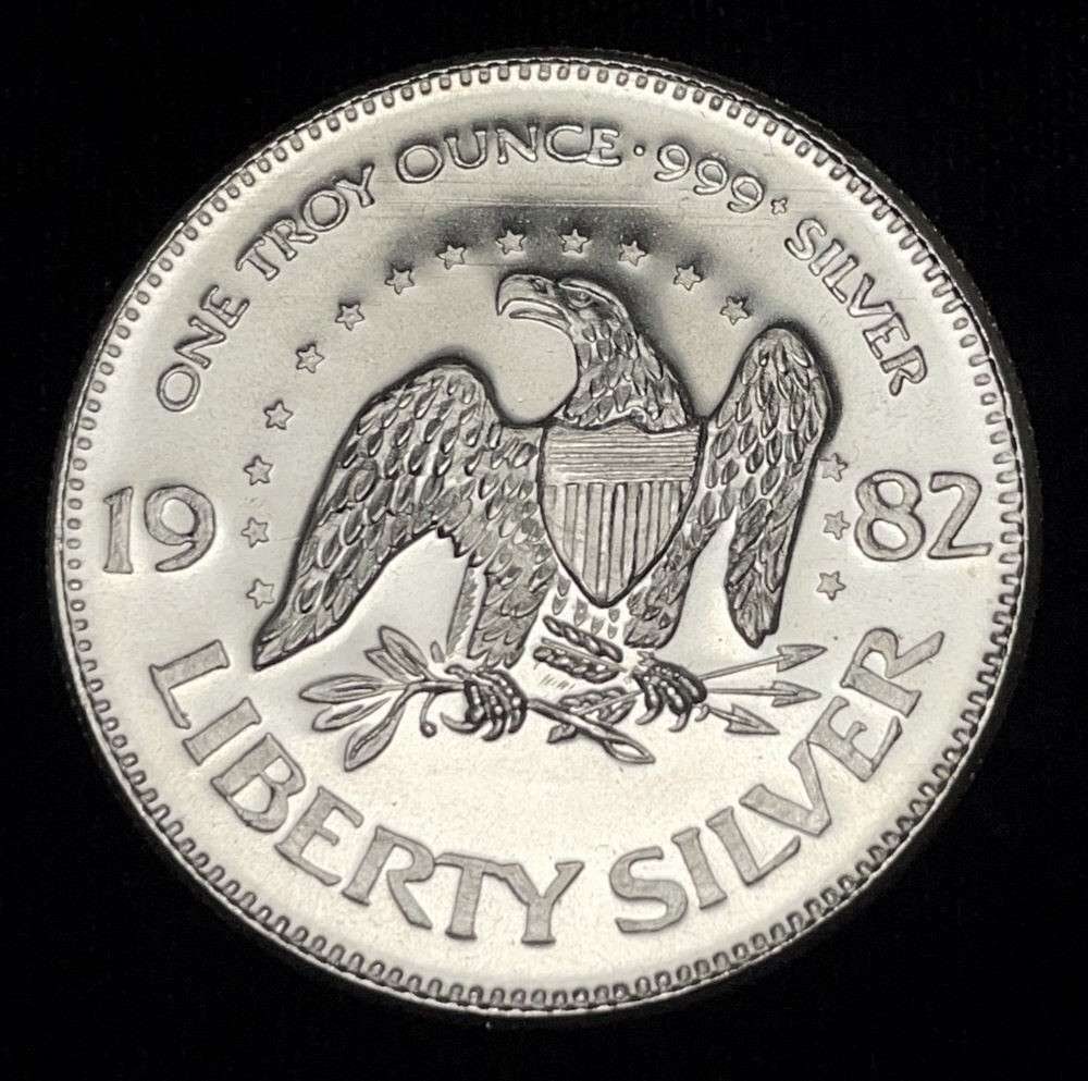 1982 A-Mark "Life Liberty Happiness" 1 ozt .999 Silver: Winner shall receive the exact coin shown here. (JM/B)