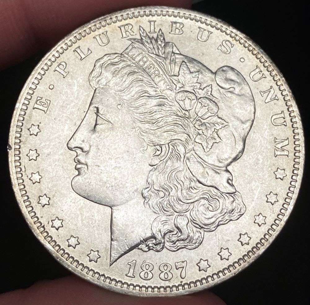 1887-O Morgan Silver Dollar MS62: Winner shall receive the exact coin shown here. (RR)