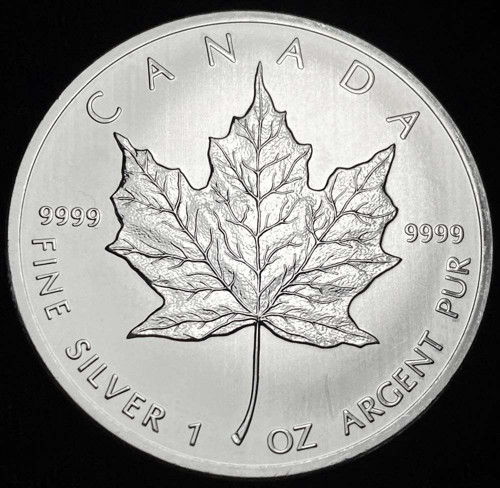 2013 Canada $5 Maple Leaf 1 ozt .9999 Silver (1 of 2)