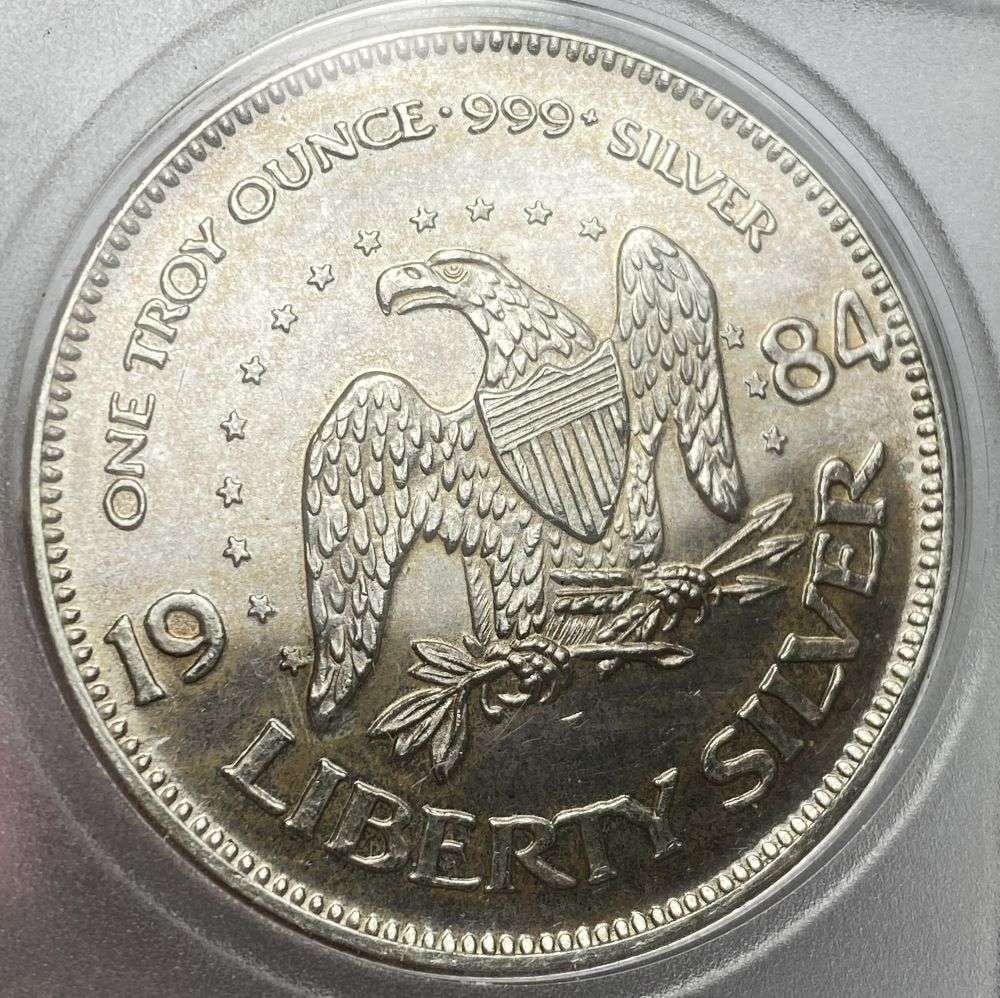 1984 A-Mark "Life Liberty Happiness" Proof 1 ozt .999 Silver: Winner shall receive the exact coin shown here. (RR/B)