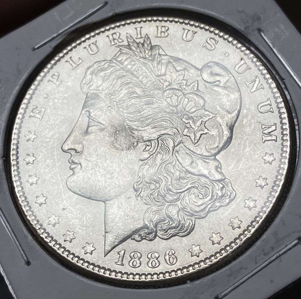 1886 Morgan Silver Dollar MS64+ (1 of 3)