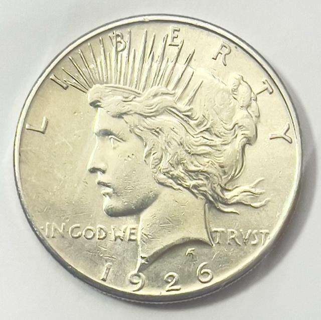 1926-S Peace Silver Dollar AU58: Winner shall receive the exact coin shown here. (SJ/B)